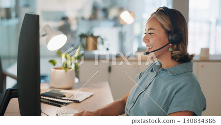 Happy woman, call center and consulting in customer service, support or telemarketing at office. Female person, consultant or agent smile with headphones in online advice, help or communication Happy woman, call center and consulting in customer service, support or telemarketing at office. Female person, consultant or agent smile with headphones in online advice, help or communication 130834386