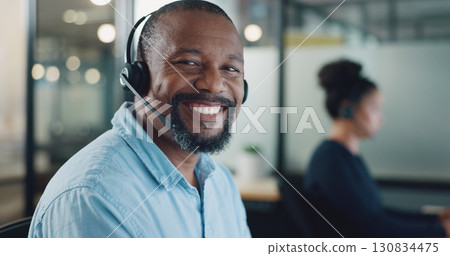 Business man, call center and consultant portrait for communication and technical support, website or software. Happy face of african agent or professional IT advisor for night solution in office Business man, call center and consultant portrait for communication and technical support, website or software. Happy face of african agent or professional IT advisor for night solution in office 130834475