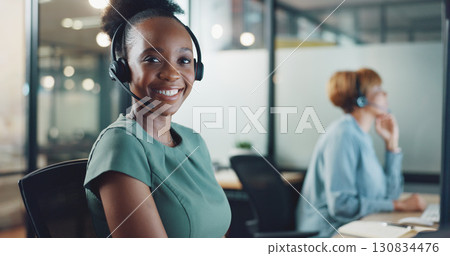Business woman, portrait and call center, communication or consultant for technical support on website or software. Happy face of IT agent, web advisor or african person, night solution and workspace 130834476