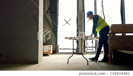 Construction blueprint, architect or man reading floor plan, property development or engineering design. Sketch, renovation or planning builder, contractor or engineer check architecture illustration 130834481