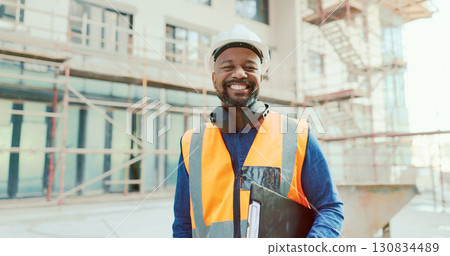 Black man, construction site and architect, inspection and smile in portrait with professional contractor and clipboard. Property development, renovation and infrastructure, architecture and boss 130834489