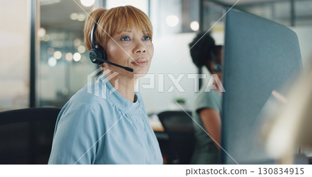 Consultant woman, computer and call center for night communication, business research and online solution. Advisor or African person reading sales report, data analytics and planning in office bokeh Consultant woman, computer and call center for night communication, business research and online solution. Advisor or African person reading sales report, data analytics and planning in office bokeh 130834915