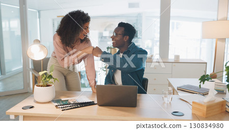 Teamwork, celebration and business people fist bump with laptop, achievement and email notification. Staff, coworkers or partnership with a pc, gesture for success or problem solving with cooperation 130834980