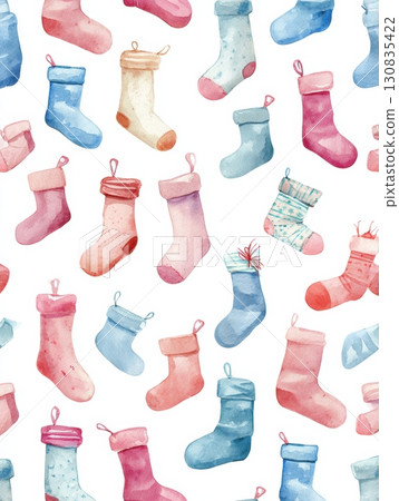 Brightly colored socks in a variety of styles and patterns are scattered across a white background, ideal for festive projects or crafts. 130835422