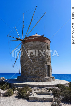 Rhodes windmills. Beautiful concept for travel and vacation in Greece. 130836013
