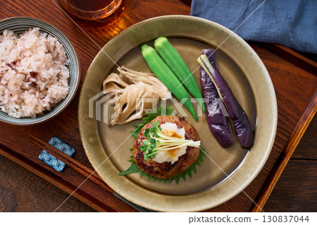 Japanese-style grated hamburger steak | A home-style main dish topped with grated daikon radish 130837044