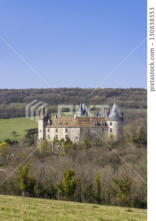 Chateau de La Rochepot rising above the Bourgogne countryside in France 130838353