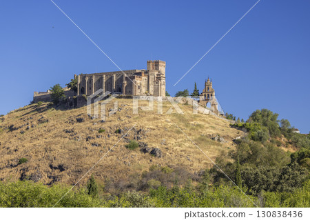Priory Church and Castle dominating the hilltop in Aracena, Spain 130838436