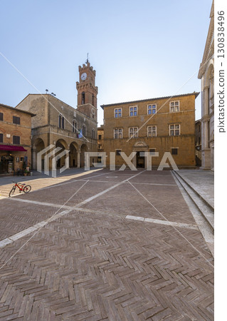 Piazza Pio II featuring Palazzo Piccolomini and the Clock Tower in Pienza, Tuscany, Italy 130838496