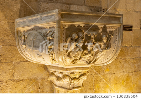 Baptismal font depicting baptism of Jesus with angels holding canopy in Monteriggioni, Italy 130838504