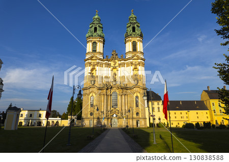 Krzeszow Abbey standing tall in Kamienna Gora, Poland, during a sunny day Krzeszow Abbey standing tall in Kamienna Gora, Poland, during a sunny day 130838588