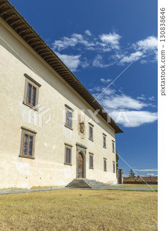 Villa Medici in Cerreto Guidi showing its facade on a sunny day with blue sky and clouds Villa Medici in Cerreto Guidi showing its facade on a sunny day with blue sky and clouds 130838646