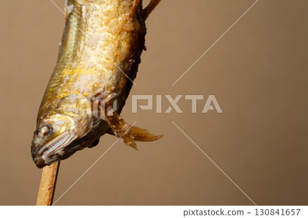 Image of charcoal-grilled salted sweetfish bought at a food stall 130841657