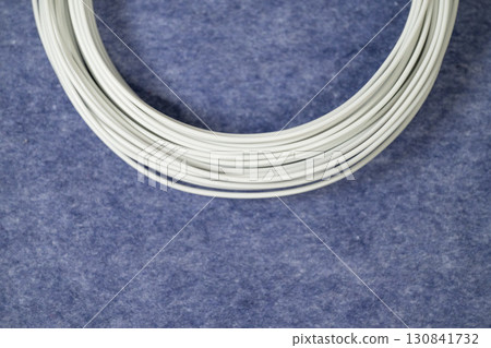 White electric wires and blue background 130841732
