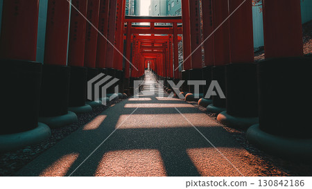 A landscape of Kyoto's spiritual approach and hope, symbolized by a row of rough vermilion torii gates 130842186