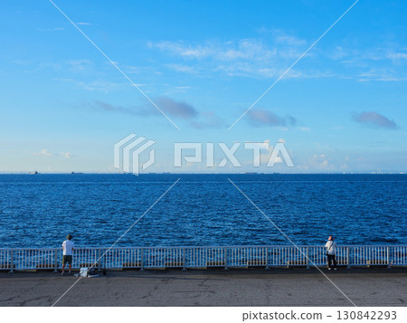 People fishing on the bank of Shin-Urayasu Park in summer 130842293