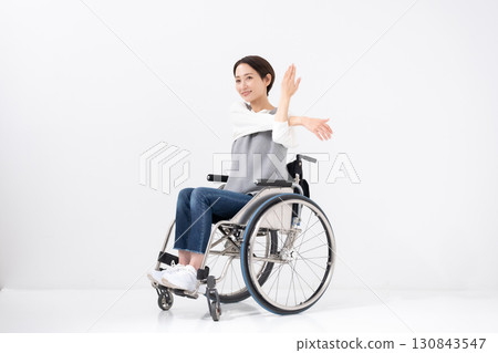 Wheelchair yoga stretching 130843547