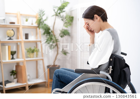 Women suffering wheelchair 130843561