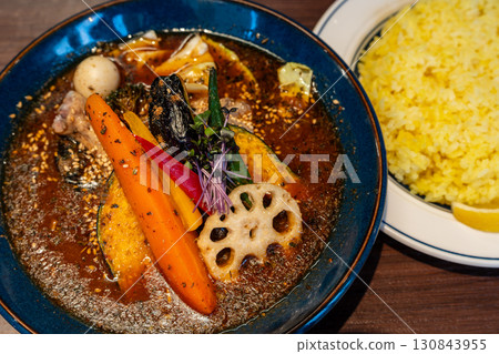 Soup curry. Enjoy Hokkaido's famous curry with vegetables and meat. Soup curry. Enjoy Hokkaido's famous curry with vegetables and meat. 130843955