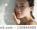 Fresh and natural beauty, image of a woman washing her face 130844489