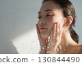 Fresh and natural beauty, image of a woman washing her face 130844490