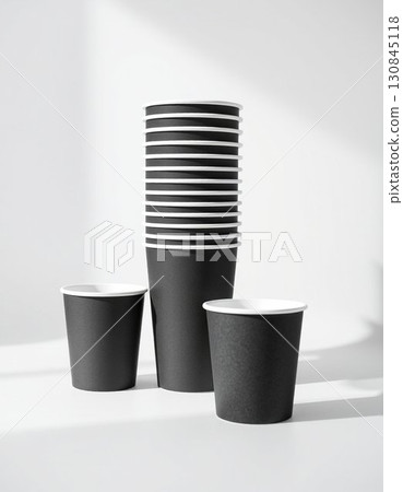 white disposable cups on white table white disposable cups on white table 130845118
