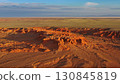 Bayanzag flaming cliffs at sunset in Mongolia 130845819