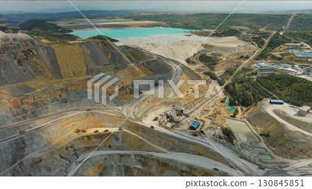 Aerial of open mine and heavy mining equipment 130845851