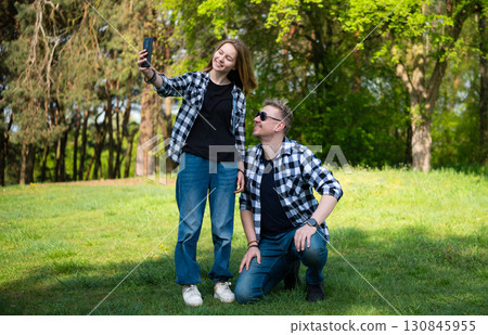 Happy Father And Daughter Taking A Selfie And Spending Time Together In The Summer Park 130845955