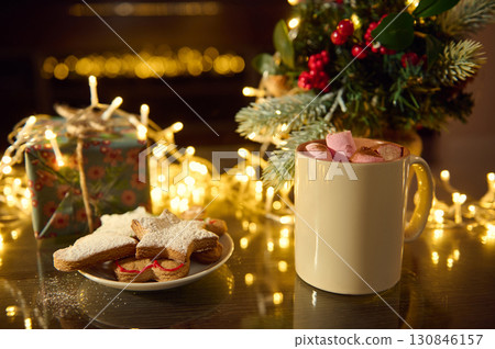 Warm Hot Chocolate with Cookies and Festive Background Decor 130846157