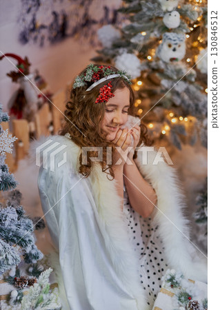 Smiling Girl in Winter Holiday Costume 130846512