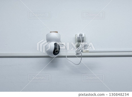 Smart security camera mounted on the wall 130848234