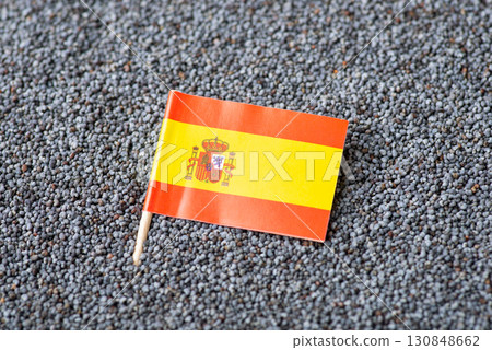 Flag of Spain in poppy seed. Growing poppy seed in Spain country concept Flag of Spain in poppy seed. Growing poppy seed in Spain country concept 130848662