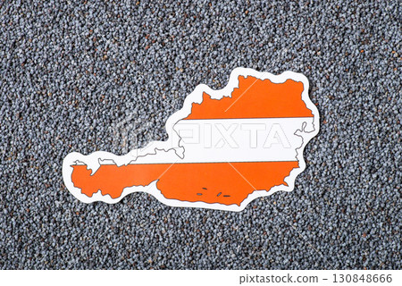 Flag of Austria in poppy seed. Growing poppy seed in Austria concept, origin of grain Flag of Austria in poppy seed. Growing poppy seed in Austria concept, origin of grain 130848666