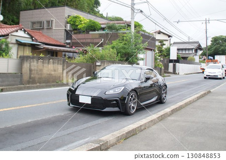 Sports car road driving 130848853