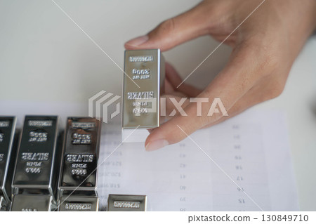 Silver Trading Businessman invest in trading silver on the stock exchange price rising. 130849710