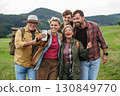 Family taking selfie on hiking trip in the nature. 130849770
