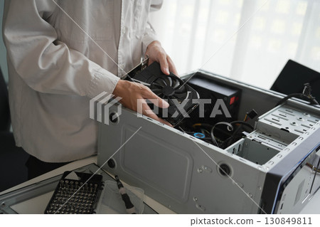 Computer Hardware dissemblers fixing computer PC. Computer Hardware dissemblers fixing computer PC. 130849811