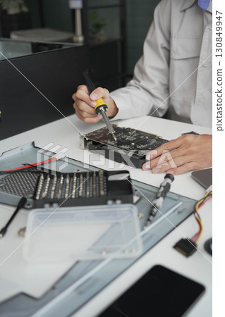 Computer Hardware dissemblers fixing computer PC. Computer Hardware dissemblers fixing computer PC. 130849947