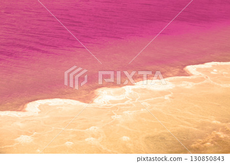 The Pink lake of Torrevieja. Salty texture of Pink lake. Water nature background The Pink lake of Torrevieja. Salty texture of Pink lake. Water nature background 130850843