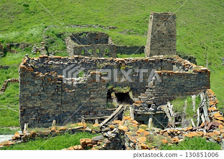 Stone ruins of residential buildings in the mountain village of Galiat in North Ossetia 130851006