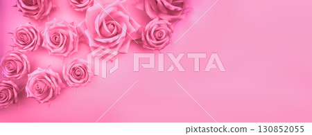 Floral background. Artificial roses on pink background. Horizontal banner 130852055