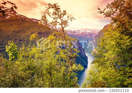 View of the Geiranger fjord from Ornesvingen Viewpoint. Beautiful nature of Norway View of the Geiranger fjord from Ornesvingen Viewpoint. Beautiful nature of Norway 130852110