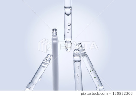 Five different droppers with facial serum. Five different droppers with facial serum. 130852303