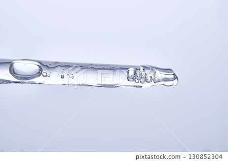 Soothing serum with natural green tea extract in a pipette. 130852304
