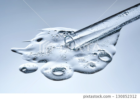 A test tube with spilled serum. Demonstration of the texture. 130852312