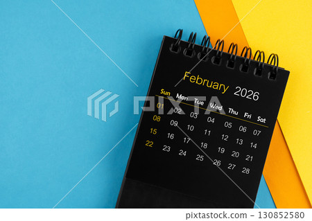 Black calendar for February 2026 on multi color background. Black calendar for February 2026 on multi color background. 130852580