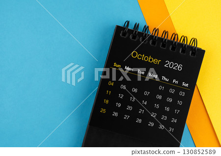 Black calendar for October 2026 on multi color background. 130852589