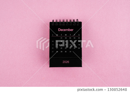 Black calendar for December 2026 year on pink color background. 130852648