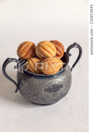 Russian traditional homemade cookies Nuts with condensed milk on an vintage jar 130853645